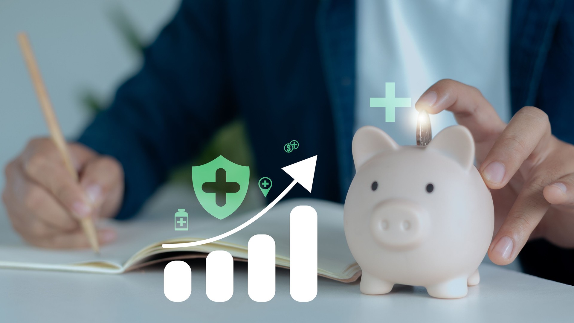 Close-up of hand putting coin into piggy bank with health icons and graph, representing medical savings, insurance planning, and financial health management.